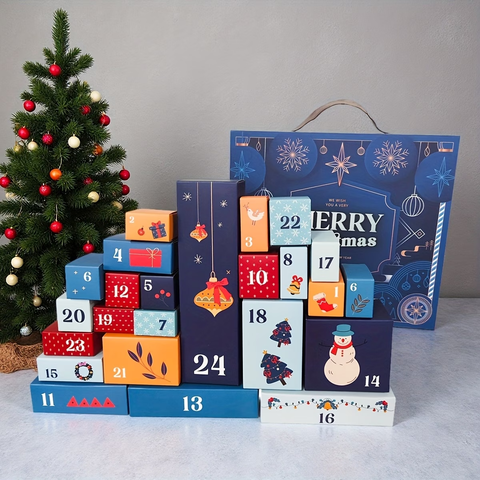Tom adventskalender: tjugofyra numrerade småaskar i blått och rött staplade framför en julgran